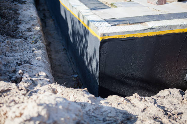 Professional Waterproofing technician working in Ardmore, PA